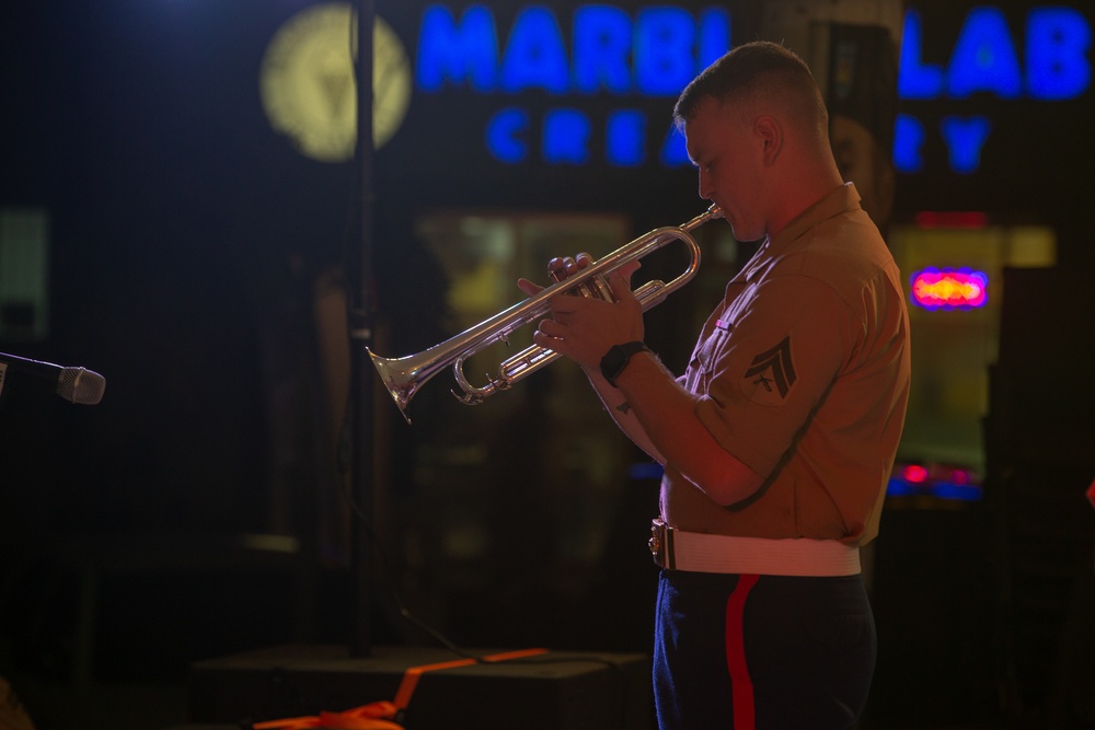 A Marine playing the trumpet.