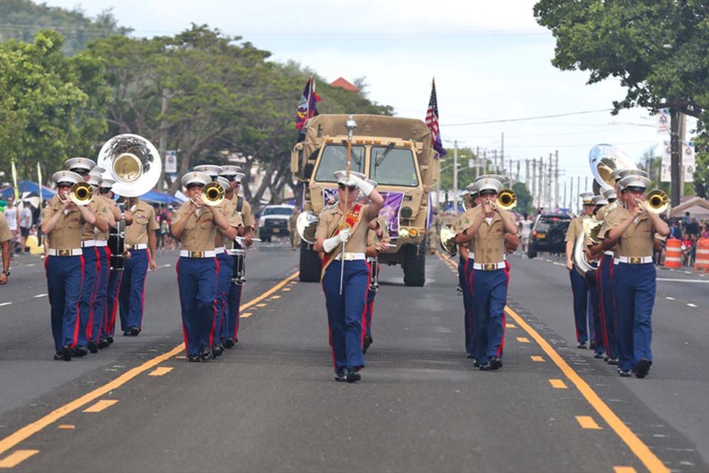 The III Marine Expeditionary Force band marches during the 75th Anniversary Liberation of Guam Parade.