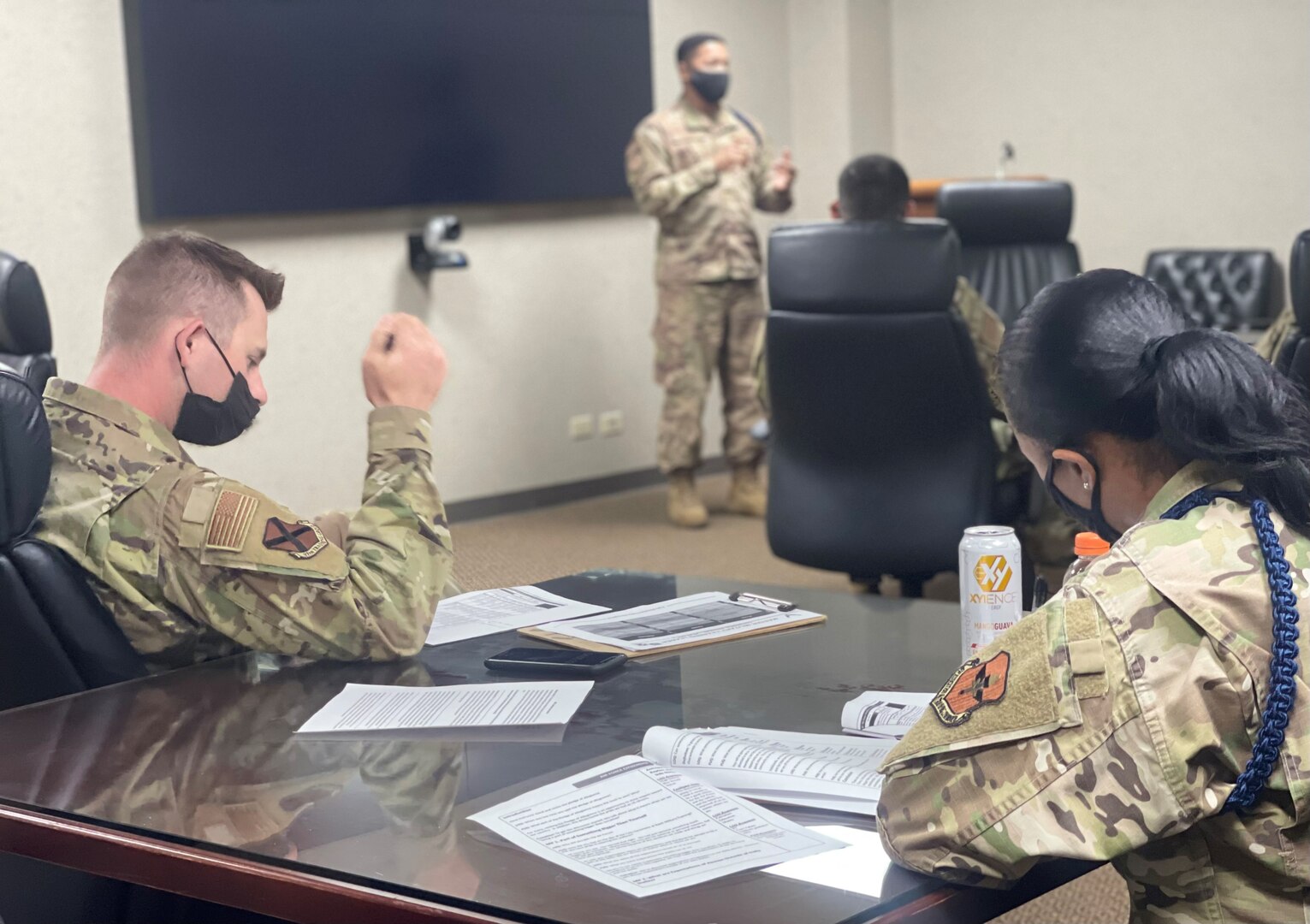 NCOs evaluating a presentation