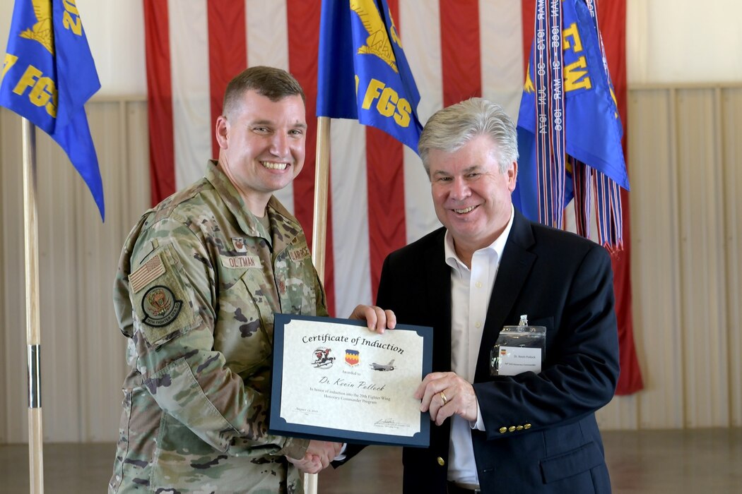 Photo of a newly inducted honorary commander.