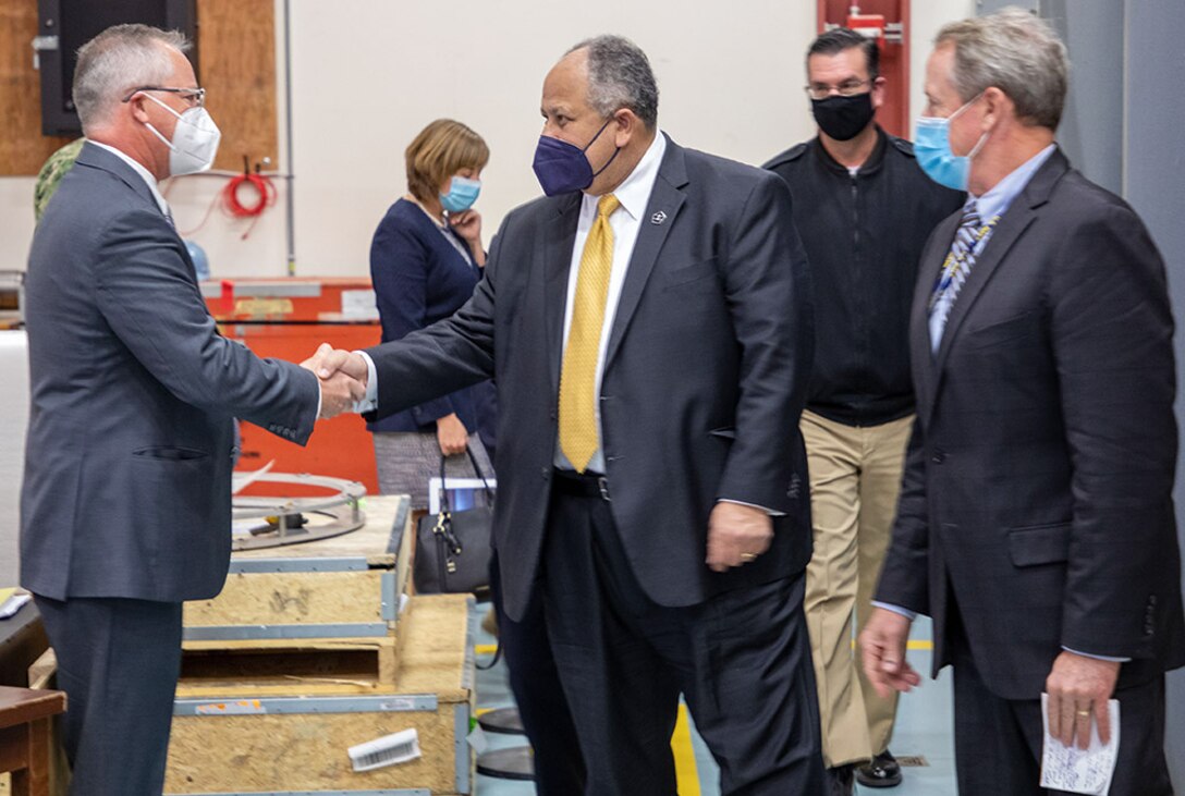 Secretary of the Navy Carlos Del Toro tours undersea vehicle lab during visit to NUWC Division Newport