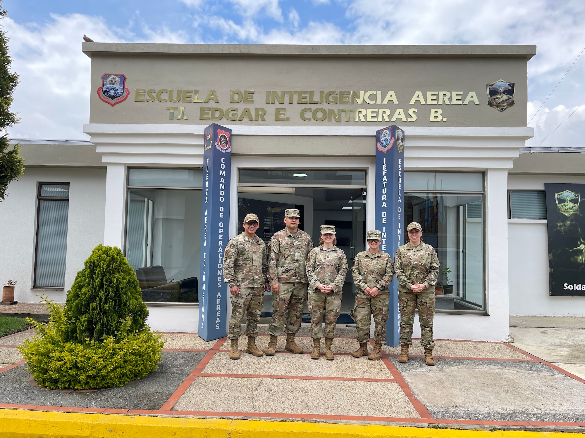 IAAFA instructors stand in front of Colombian school