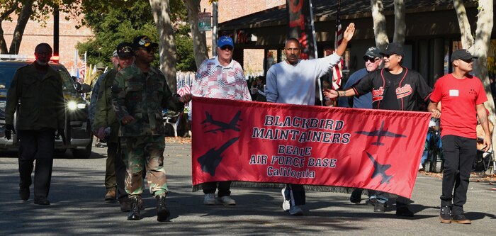 Maintainers from Beale Air Force Base walk in a Veterans Day Parade Nov. 11, 2021, in Marysville, California.