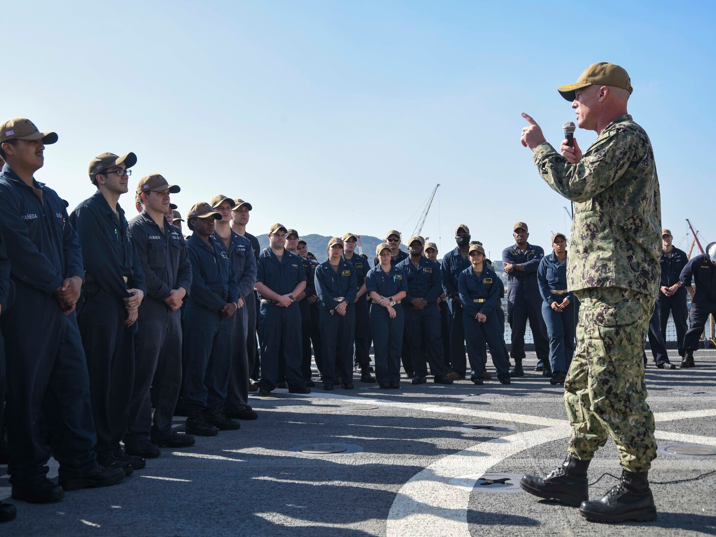 Rear Adm. Chris Engdahl, commander of Expeditionary Strike Group (ESG) 7, Task Force (CTF) 76, meets with Sailors of the USS Rushmore (LSD 47) on Commander Fleet Activities,  Sasebo Japan, Nov. 17, 2021.  Rushmore, part of Amphibious Squadron 11, is forward deployed in the U.S. 7th Fleet area of responsibility to enhance interoperability with allies and partners and serve as a ready response force to defend peace and stability in the Indo-Pacific region.