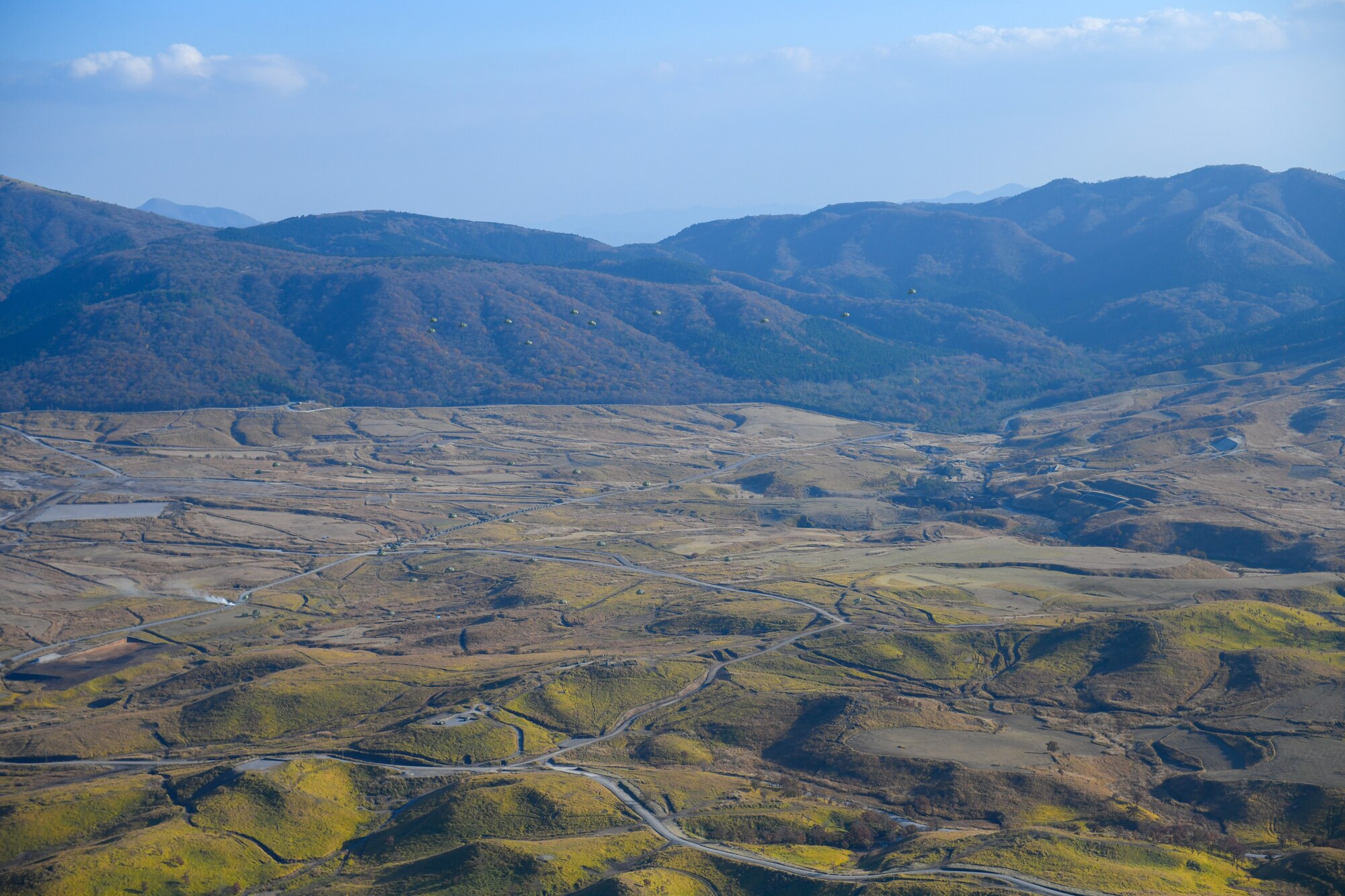 Japan Ground Self-Defense Force soldiers descend over Hijudai drop zone