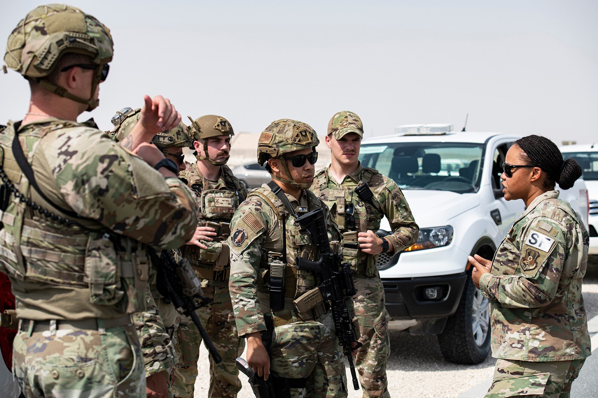 Security Forces talk to each other before training.