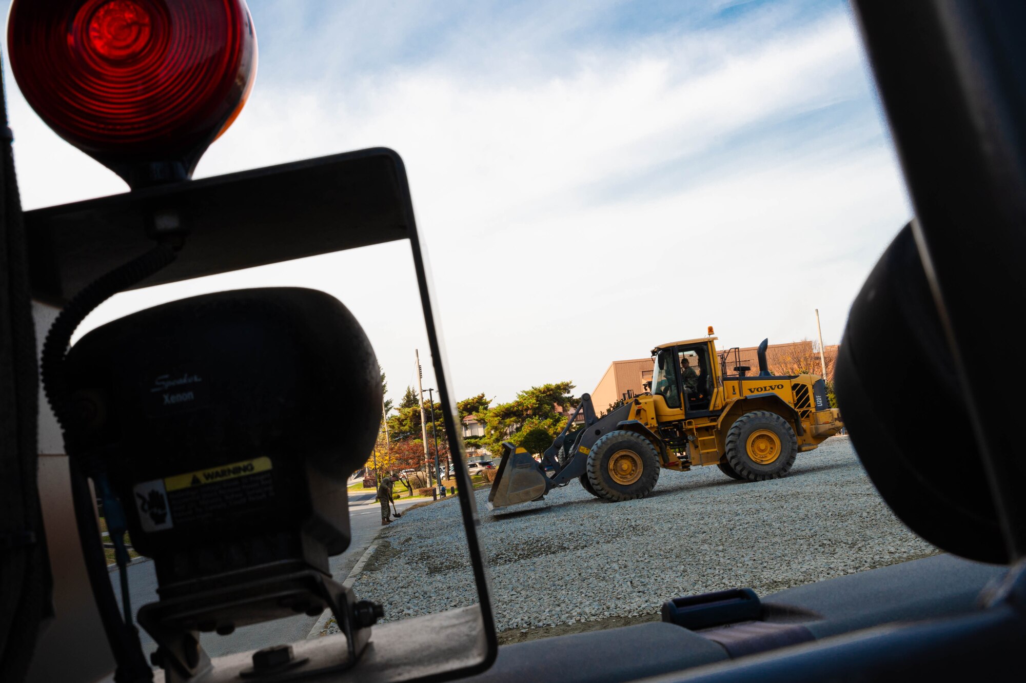 51st Civil Engineer Squadron pavements and equipment Airmen, level gravel for a parking lot at Osan