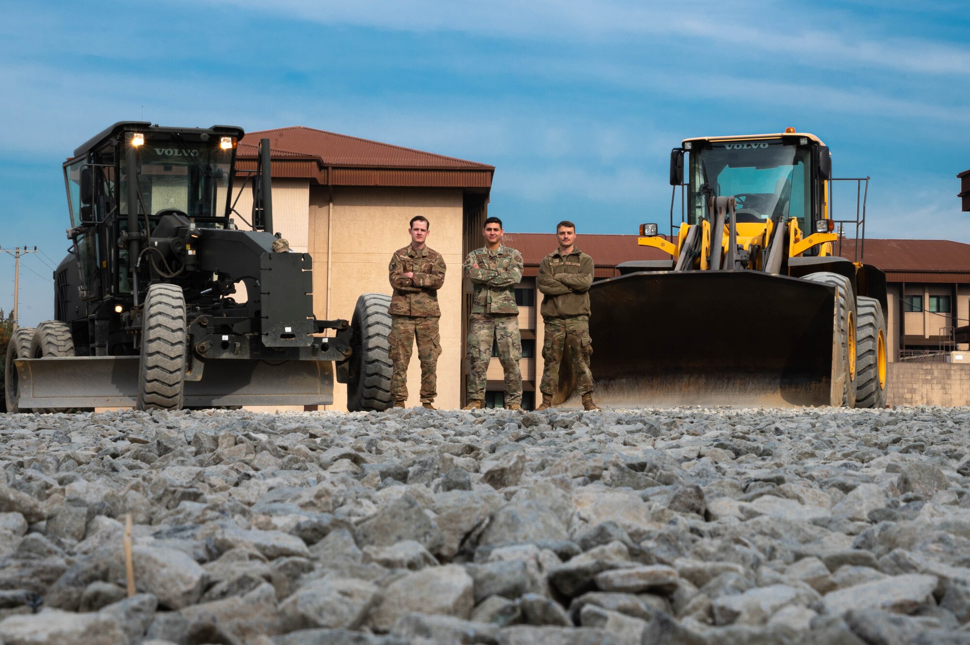 51st Civil Engineer Squadron pavements and equipment shop, poses for a picture at a parking lot at Osan