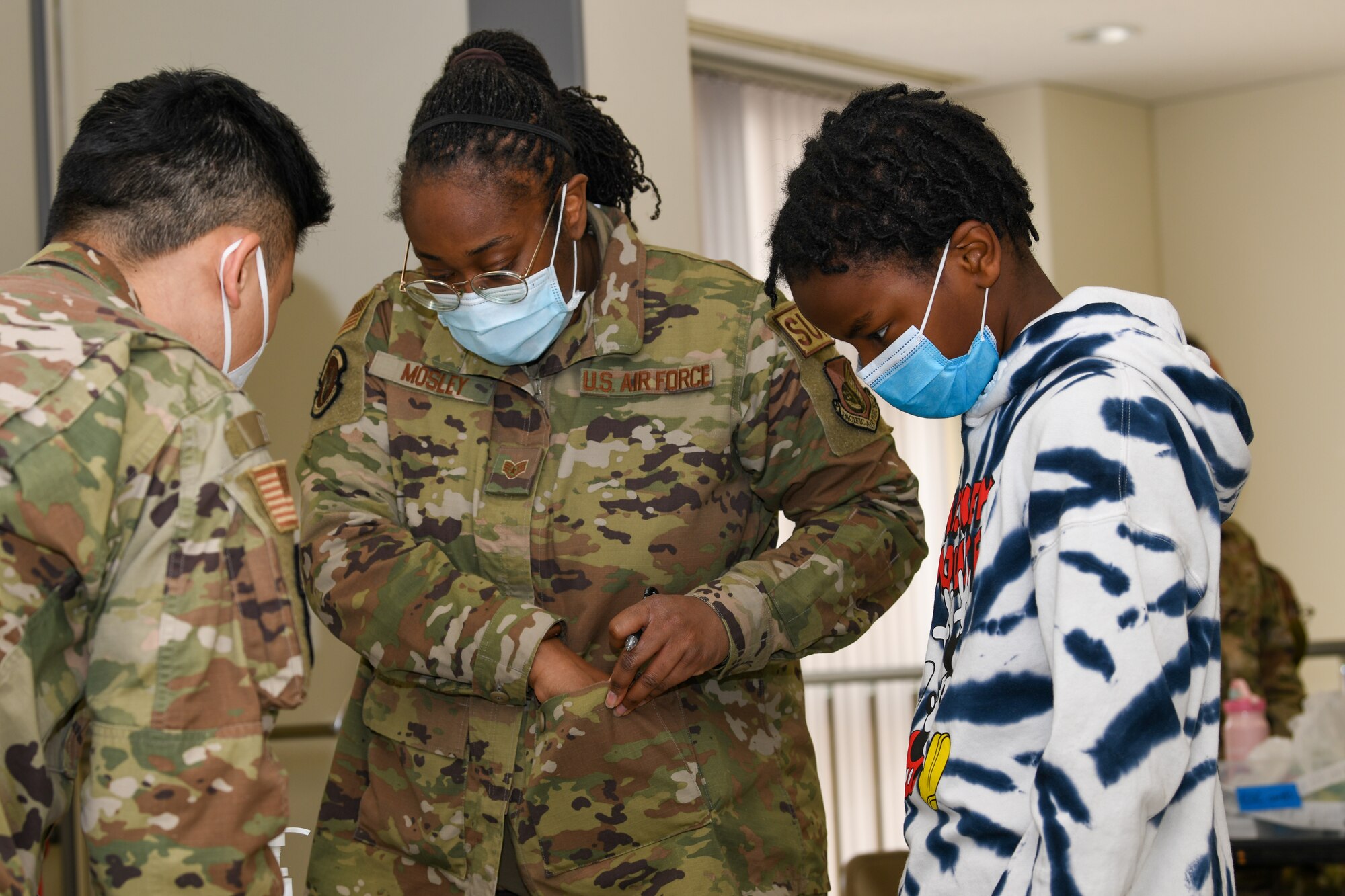 Family prepares to receive the pediatric version of Pfizer’s COVID-19 vaccine