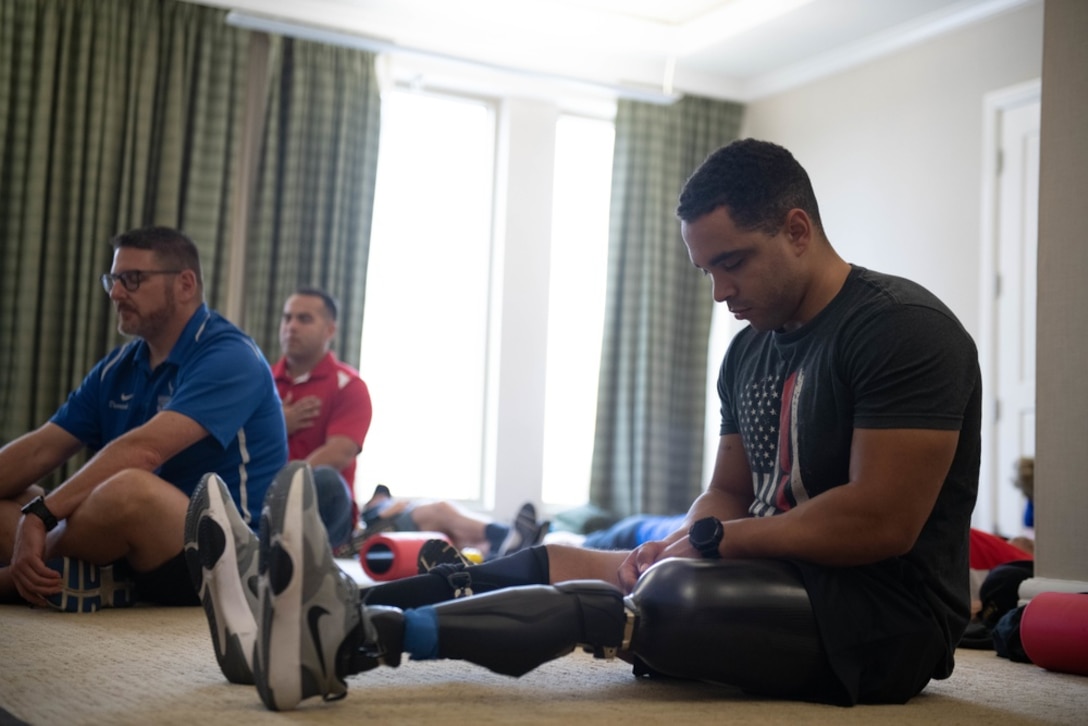 U.S Marine Corps Cpt. Andrew Hairston meditates during the 2021 Warrior Care Week, November 16, 2021. During the 2021 Warrior Care Week, the Warrior Care Program hosts a variety of activities in San Antonio, Texas at the Mission Conception Sports Complex for wounded, ill and injured service members to include, adaptive sports introductions, team sport practices, a healing arts expo, and transition events. The event aims to bring service members together and to sharpen their skills and support their journey to recovery.