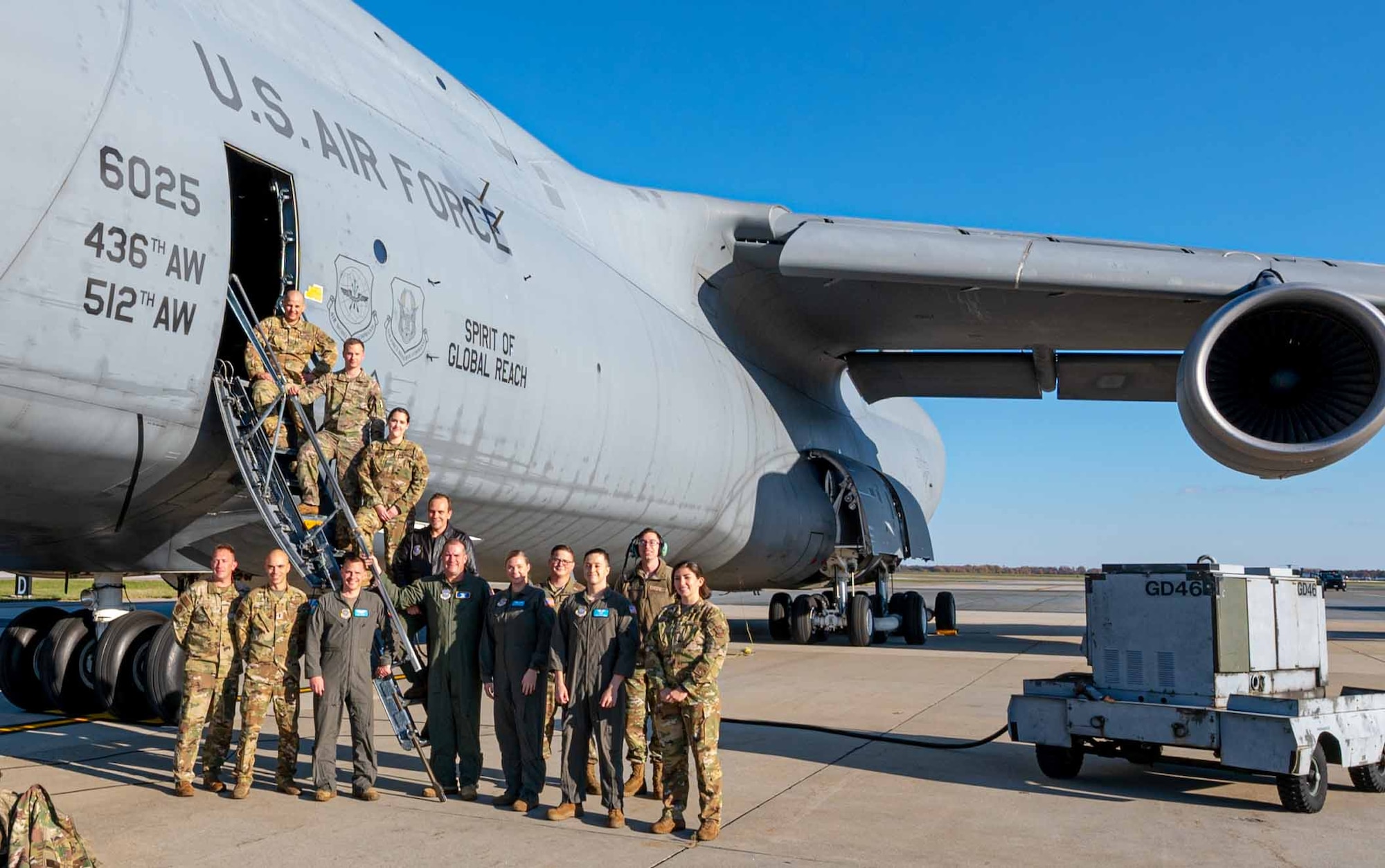 Maj. Gen. Thad Bibb, 18th Air Force commander, poses for a photo with Airmen from the 9th Airlift Squadron and 436th Aircraft Maintenance Squadron at Dover Air Force Base, Delaware, Nov. 16, 2021. During his tour, Bibb, who commanded the 9th AS from 2006-2009, is a command pilot with more than 5,000 hours in seven different aircraft. (U.S. Air Force photo by Senior Airman Faith Schaefer)