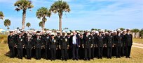 The Hon. Rupert Soames, OBE, is pictured with (DDG 81) crew members present for the change of command ceremony.