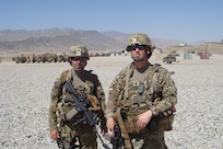 Lt. Col. Thomas H. Mancino poses with Capt. Khalid Hussien, Oklahoma National Guard, while deployed to Afghanistan in 2011. Mancino served as the commander of the 45th Brigade Special Troops Battalion, 45th Infantry Brigade Combat Team.