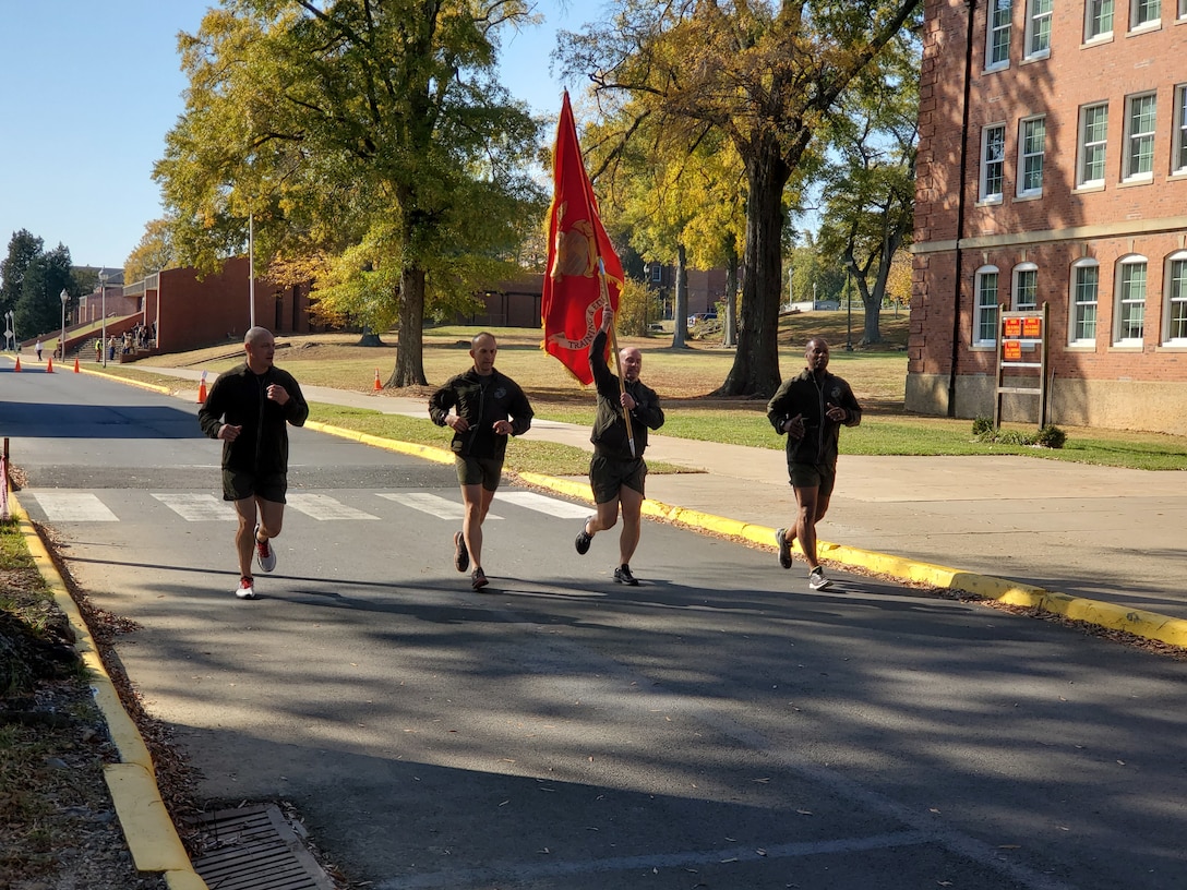 U.S. Marines with Training and Education Command conduct a Marine Corps birthday run on Marine Corps Base Quantico, Virginia, Nov. 9, 2021. Marines took turns running a mile each from 0530 Nov. 9th through 1200 Nov. 10th for a total of 246 miles.