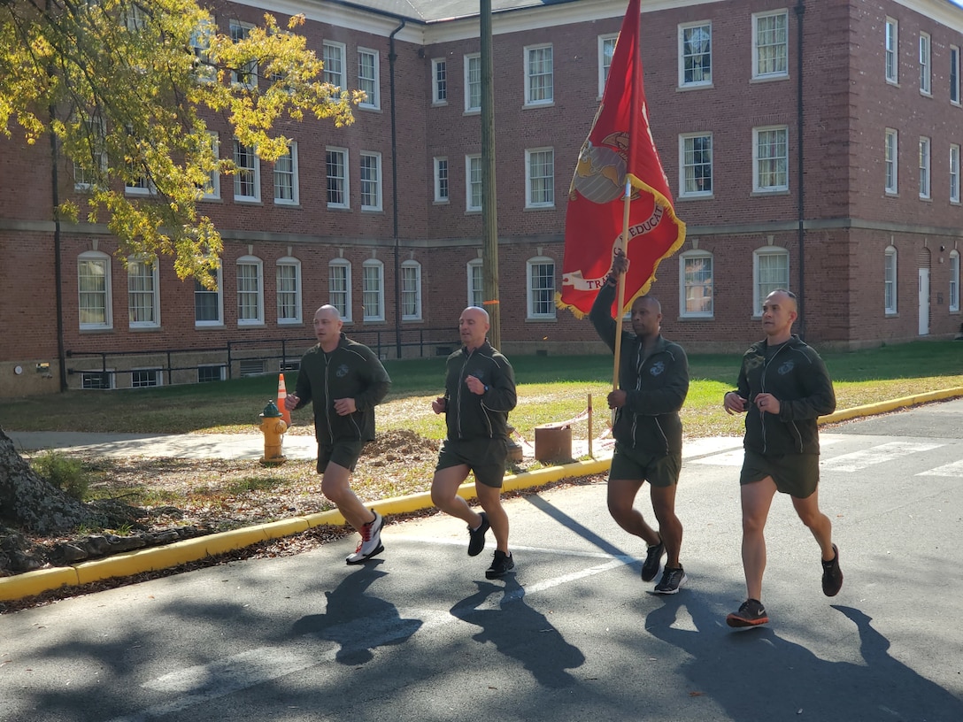 U.S. Marines with Training and Education Command conduct a Marine Corps birthday run on Marine Corps Base Quantico, Virginia, Nov. 9, 2021. Marines took turns running a mile each from 0530 Nov. 9th through 1200 Nov. 10th for a total of 246 miles.