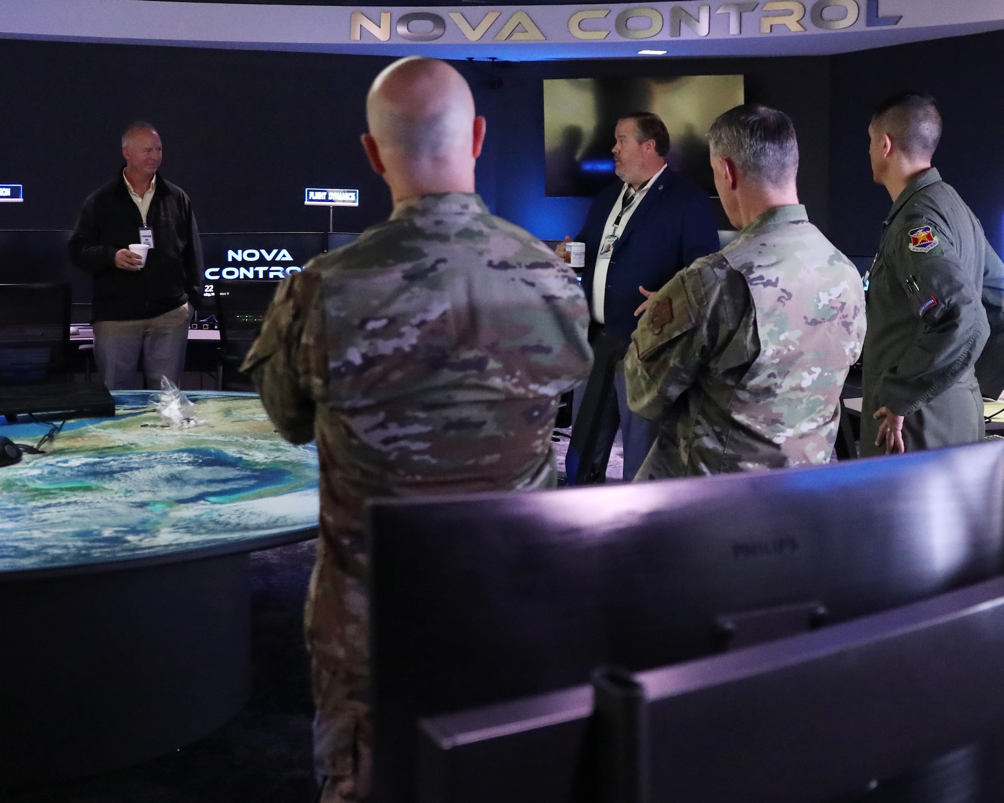 147th Attack Wing and NGB Space Operations Leaders recieve a briefing at Intuitive Machines.
