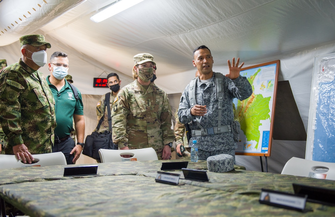 U.S. Army Gen. Laura Richardson, commander of U.S. Southern Command, is briefed by Colombian commando training battalion personnel during a visit to Colombia’s Fort Tolemaida.