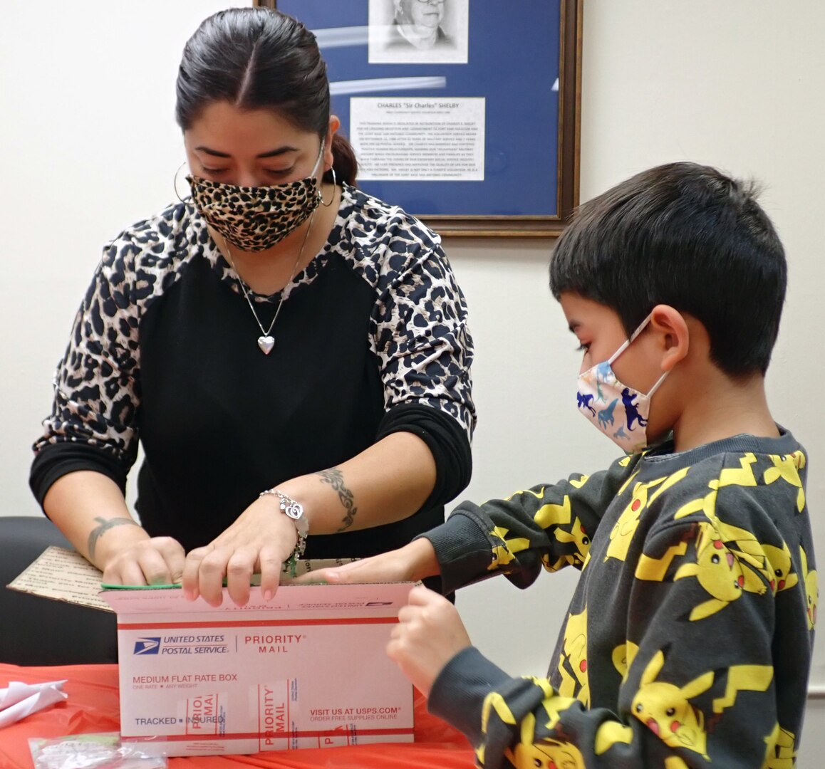 Holiday in a Box event spreads holiday cheer to families of deployed service members