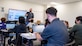 Shane Oliva, Anchored4Life instructor, gives out final tips for Irving L. Branch Elementary School's first group of team leaders at Edwards Air Force Base, California, Nov. 17. (Air Force photo by Giancarlo Casem)