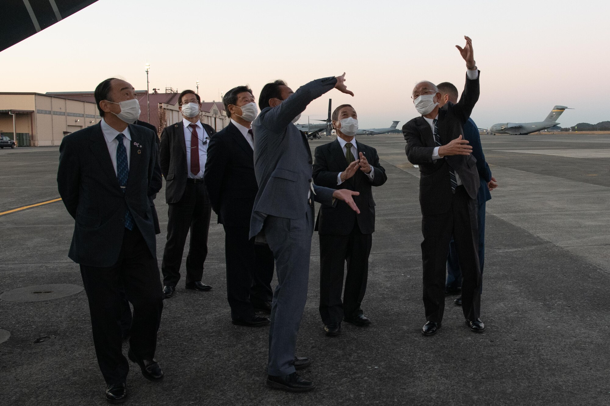 Mayors from the Kanto, Tohoku, and Hokkaido prefectures, tour a CV-22 Osprey static display at Yokota Air Base, Japan, Nov. 15, 2021. During their visit to Yokota, the mayors learned about Yokota's strategic importance to the region and the defense of Japan. (U.S. Air Force photo by Airman 1st Class Brooklyn Golightly)