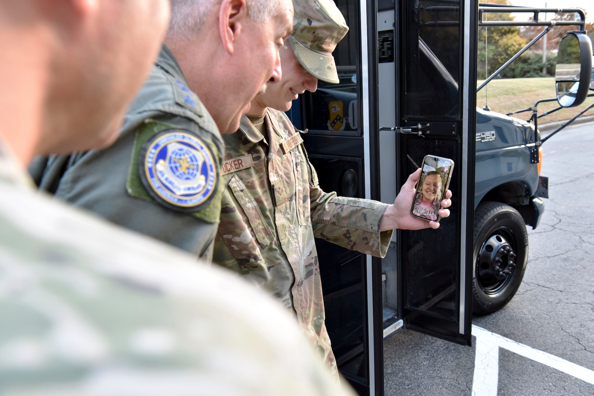 An Airmen FaceTimes his wife with Gen. Minihan.