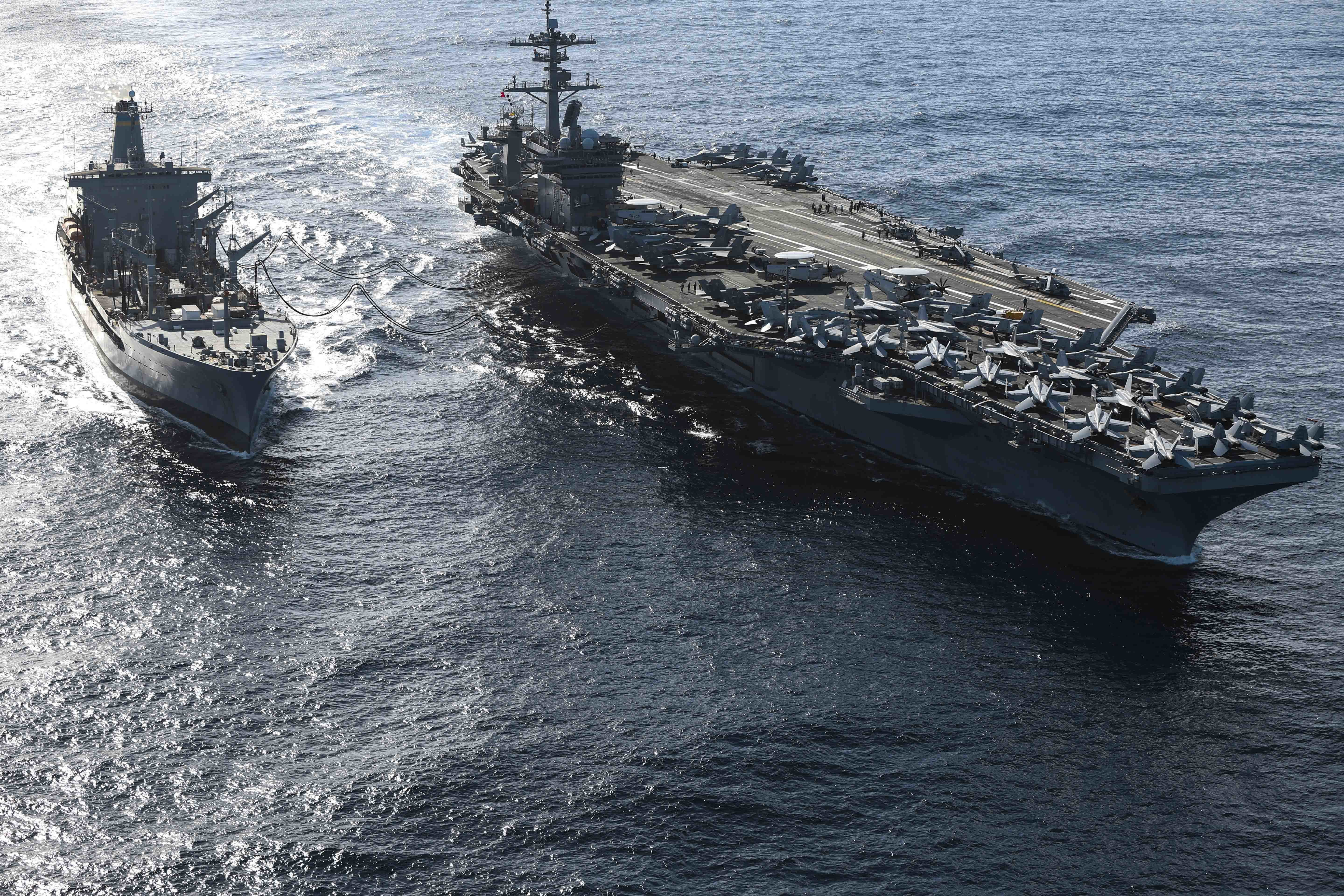 The Maritime Sealift Command fleet replenishment oiler USNS Henry J. Kaiser (T-AO 187) conducts a replenishment-at-sea with the aircraft carrier USS Abraham Lincoln (CVN 72). Abraham Lincoln is underway conducting routine operations in the U.S. 3rd Fleet.