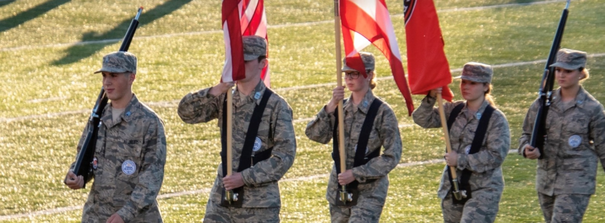 Aaron Staiger (front) leads the Air Force Junior ROTC Honor Guard as it presents the colors before Beavercreek High School’s home football game Sept. 10. Staiger is a cadet lieutenant colonel and deputy commander in the JROTC unit. (Contributed photo)
