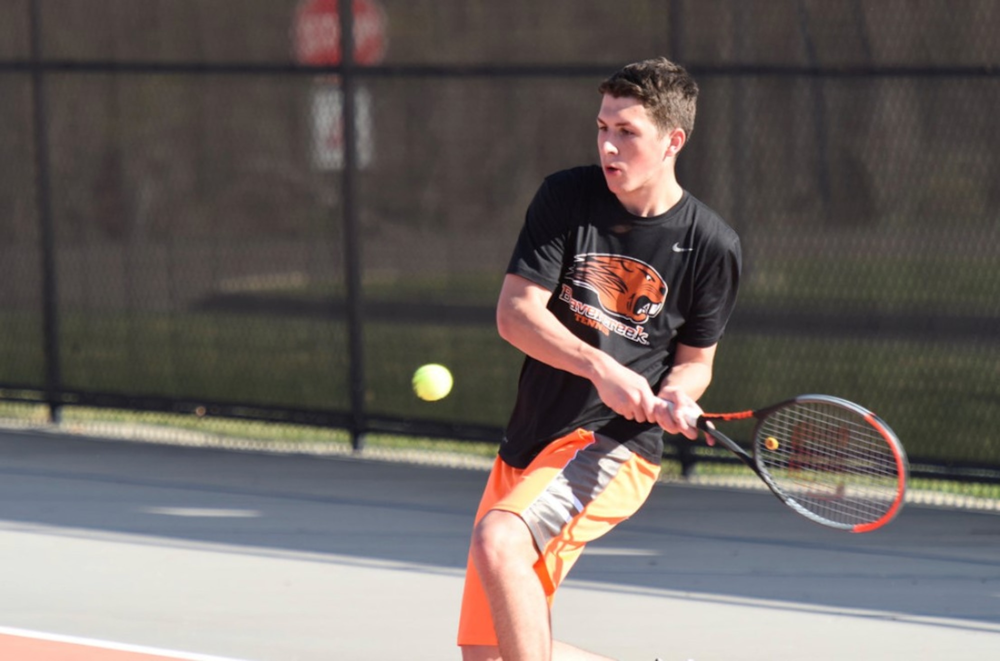Beavercreek High School senior Aaron Staiger works on his backhand during varsity team practice earlier this fall. Tennis is among his many after-school activities. (Contributed photo)