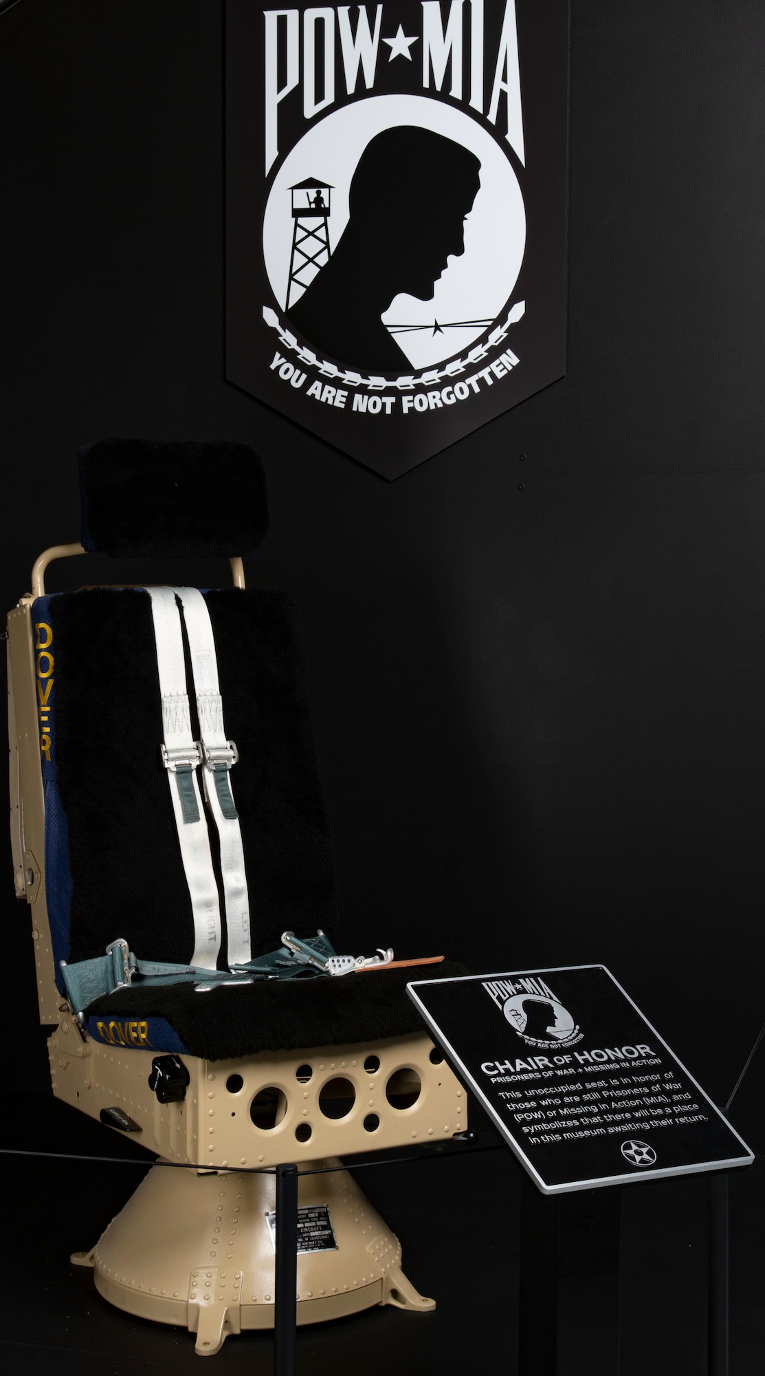 The Chair of Honor display is the latest addition to the Air Mobility Command Museum on Dover Air Force Base, Delaware, Nov. 9, 2021. The chair is from the flight engineer’s position on a C-5A Galaxy and was unveiled during a Veterans Day ceremony at the museum. (U.S. Air Force photo by Roland Balik)