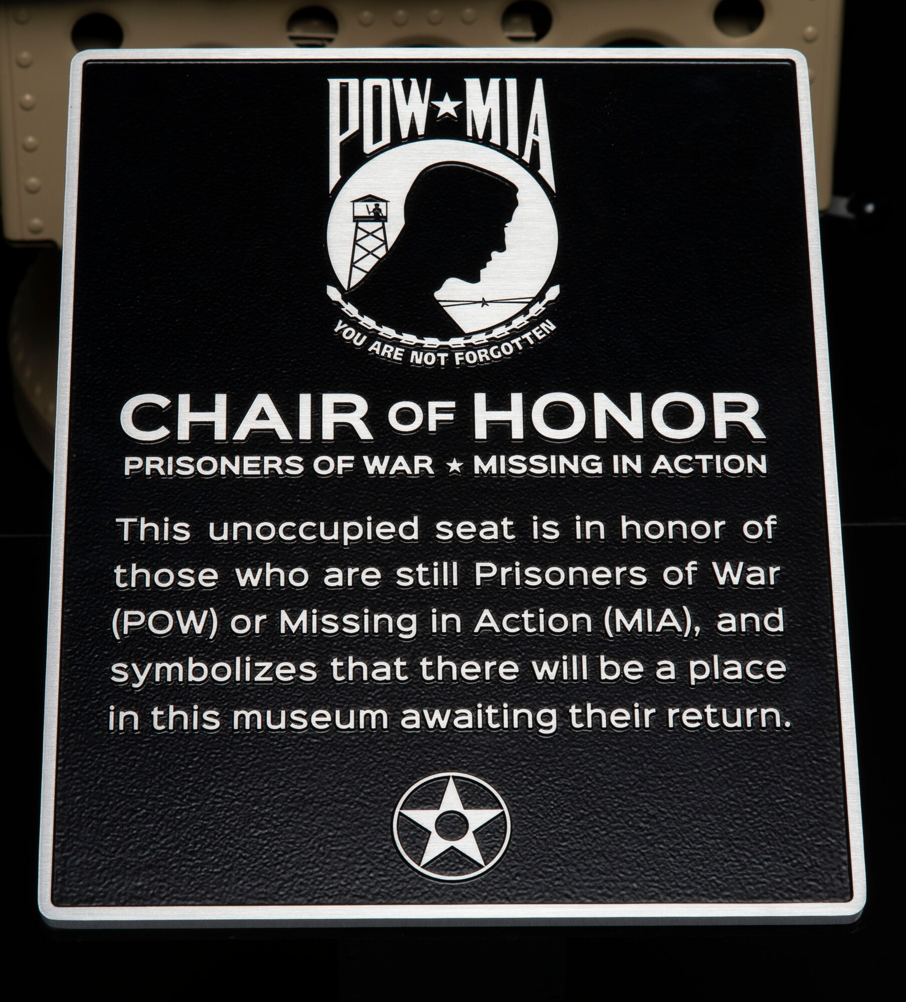 The Chair of Honor display is the latest addition to the Air Mobility Command Museum on Dover Air Force Base, Delaware, Nov. 9, 2021. The chair is from the flight engineer�s position on a C-5A Galaxy and was unveiled during a Veterans Day ceremony at the museum. (U.S. Air Force photo by Roland Balik)