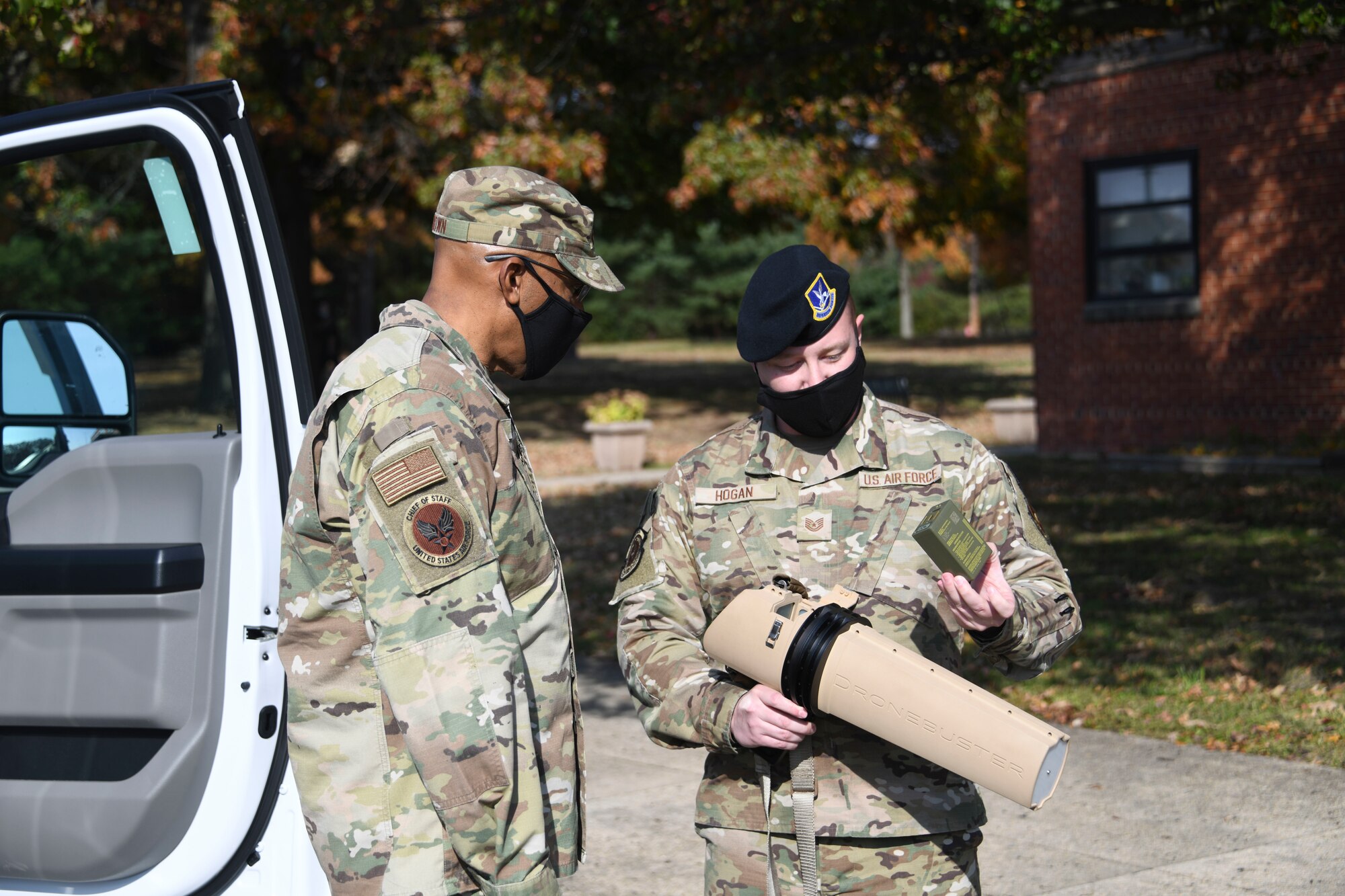 Tech. Sgt. Jeremy Hogan, 316th Security Forces Squadron resources NCO in-charge, demonstrates the capabilities of a counter-small unmanned aircraft system for Air Force Chief of Staff Gen. CQ Brown, Jr., at Joint Base Andrews, Md., Nov. 17, 2021. The counter -system provides installation security by being able to directly target any UAS system that attempts to breach JBA airspace. (U.S. Air Force photo by Senior Airman Spencer Slocum/Not Released)