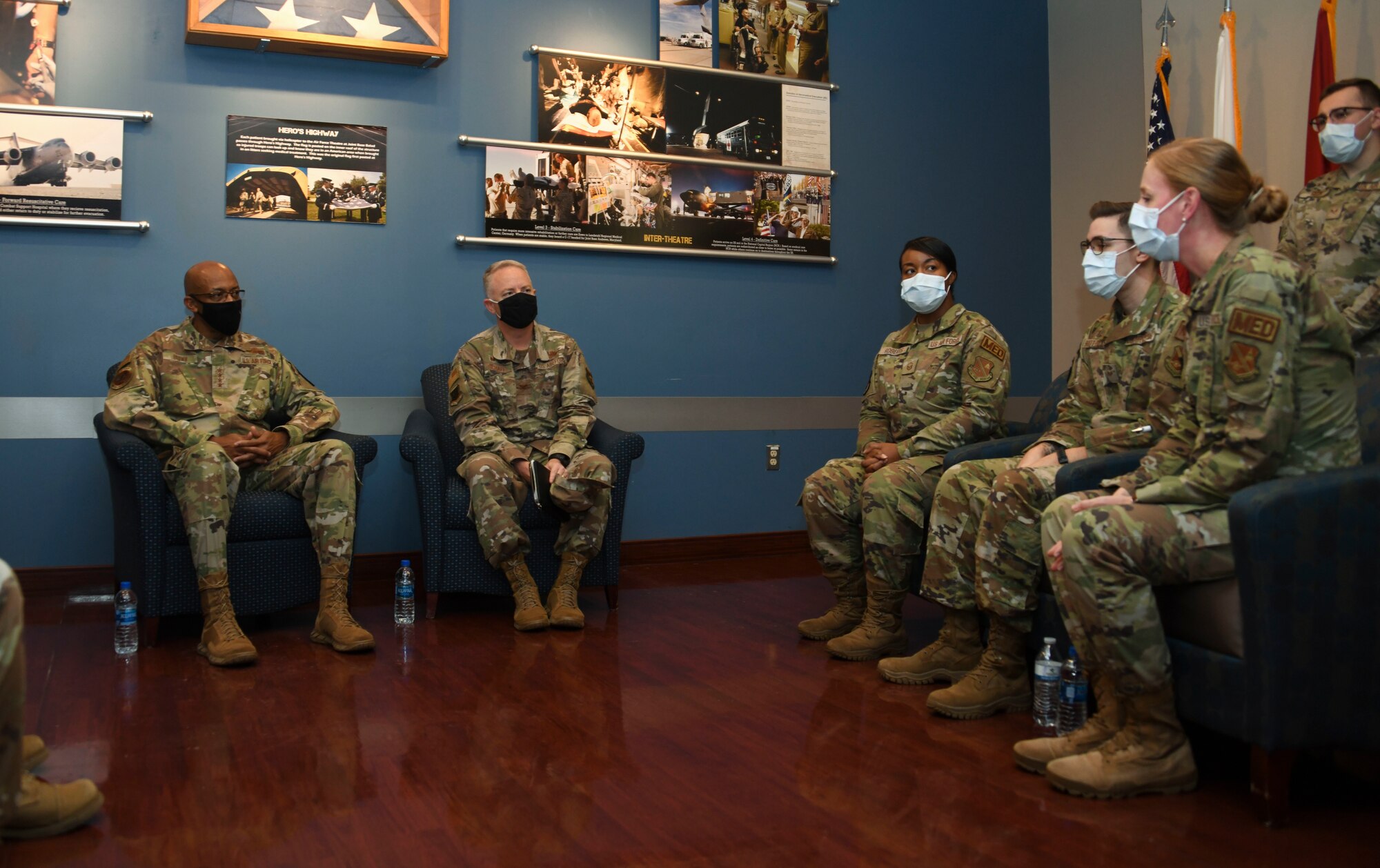 Air Force Chief of Staff Gen. CQ Brown, Jr., (left) listens to a brief about operations at the 316th Medical Group Aeromedical Staging Facility at Joint Base Andrews, Md., Nov. 17, 2021. The facility has many functions, including being a first stop for Department of Defense personnel who have been injured overseas in support of combat operations. (U.S. Air Force photo by Senior Airman Spencer Slocum)