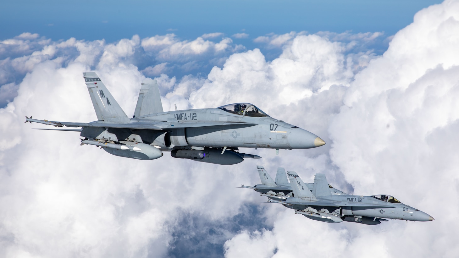 U.S. Marine Corps F/A-18 Hornet aircraft with Marine Fighter Attack Squadron (VMFA) 112 fly during an aerial refueling exercise in Japan, Nov. 16, 2021.