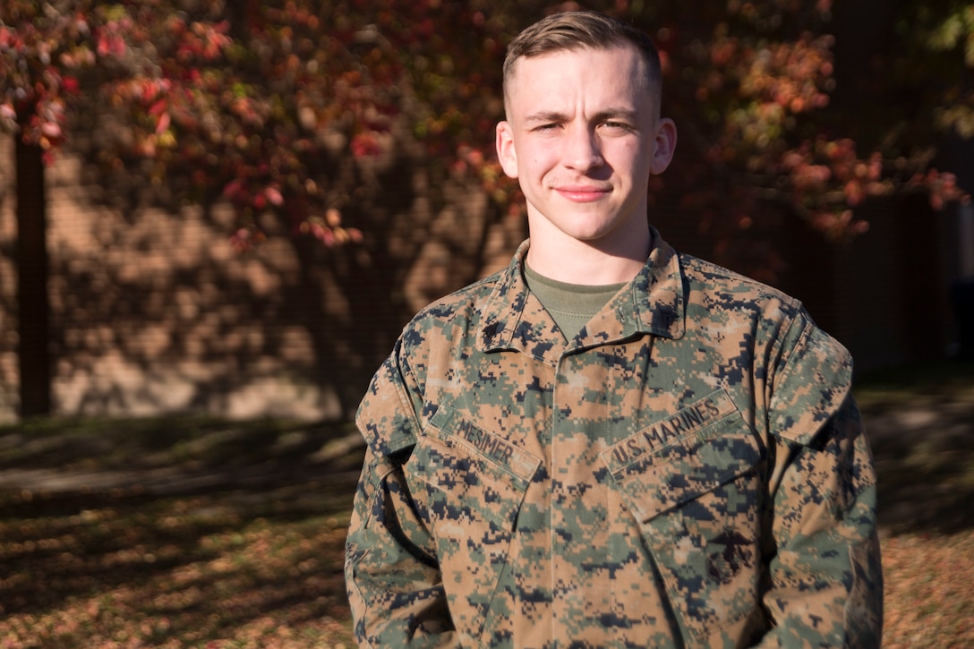 U.S. Marine Corps Cpl. Holden L. Mesimer poses for a photo at Camp Elmore, Norfolk, Va., Nov. 16, 2021. Mesimer is a Marine Air-Ground Task Force Planning specialist for Plans, Policies and Operations South.