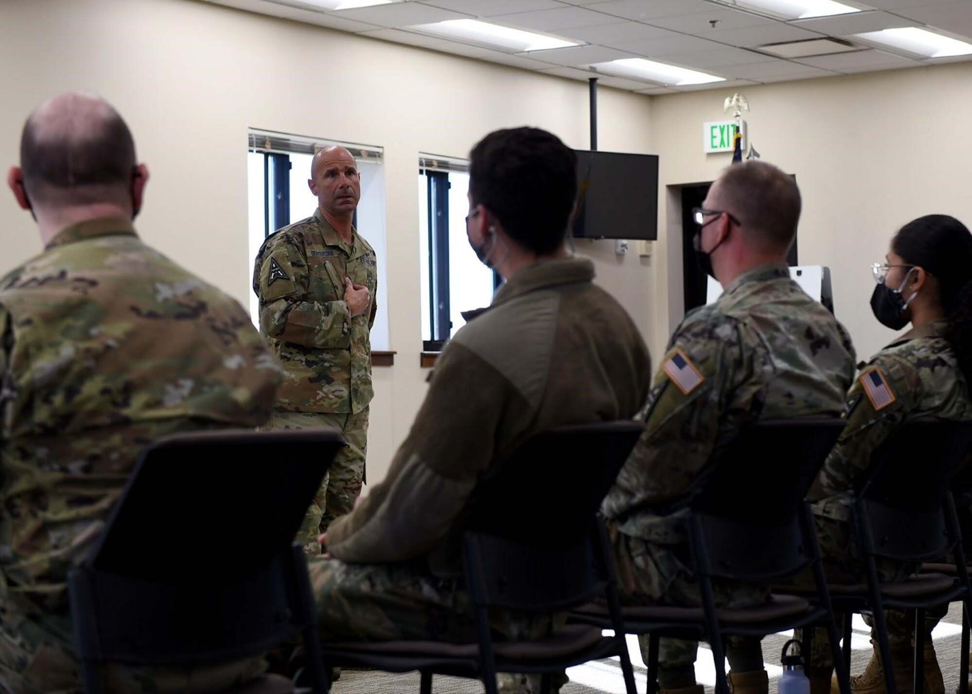 U.S. Space Force Chief Master Sgt. John Bentivegna, Space Operations Command senior enlisted leader, speaks to enlisted members at Buckley Space Force Base, Colo., Nov. 17, 2021. Bentivegna held an enlisted all-call to answer questions and concerns from members that are assigned to SpOC. (U.S. Space Force photo by Senior Airman Haley N. Blevins)