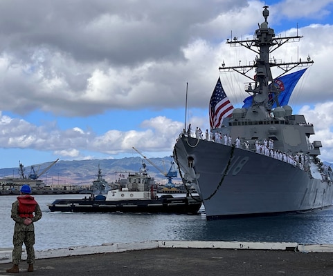 The future USS Daniel Inouye (DDG 118) arrives at Joint Base Pearl Harbor-Hickam.