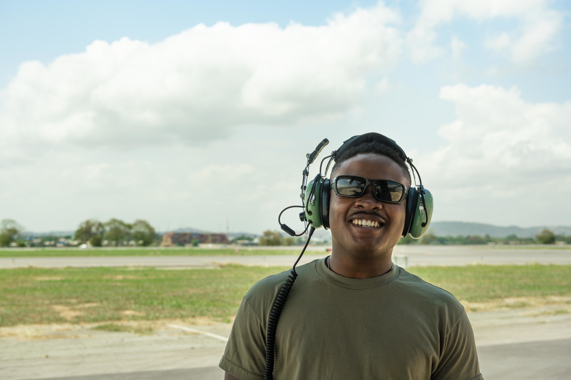 An Airman poses for a photo