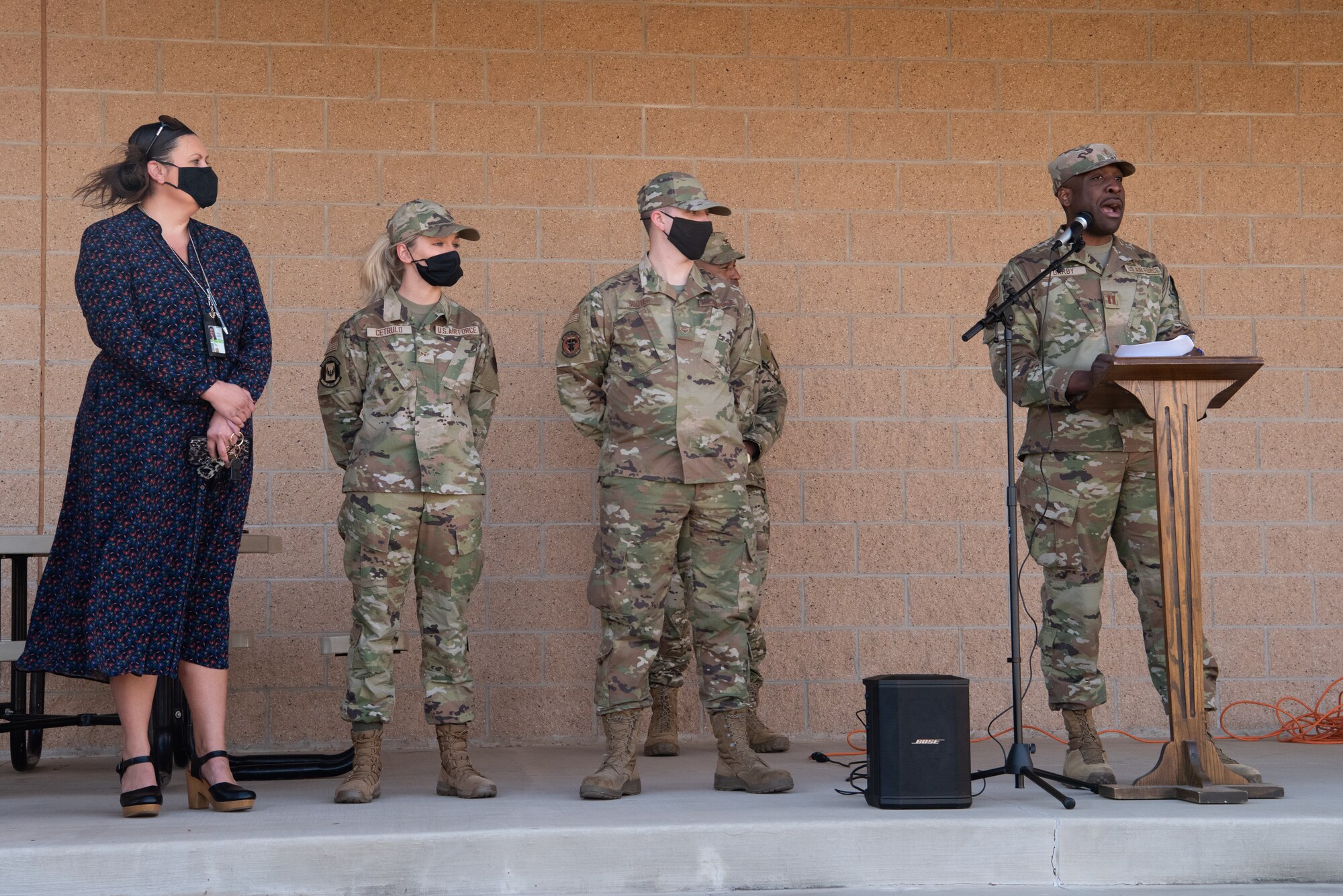 Capt. Arthur Darby II (right), a chaplain assigned to the 27th Special Operations Wing, recognizes Airman 1st Class James Sooter (center right), a maintainer assigned to the 27th Special Operations Aircraft Maintenance Squadron , Airman 1st Class Katheryn Cetrulo (center left), 27th Special Operations Force Support Squadron, and Bianca Daugherty, a civilian at the base chapel, for their assistance in establishing the Airmen Ministry Center on Cannon Air Force Base, N.M., Nov. 17, 2021. The Airmen Ministry Center was established to build spiritually resilient Airmen at Cannon by developing an authentic community, promoting servant leadership, and providing service to others. (U.S. Air Force photo by Airman 1st Class Alexis Sandoval)