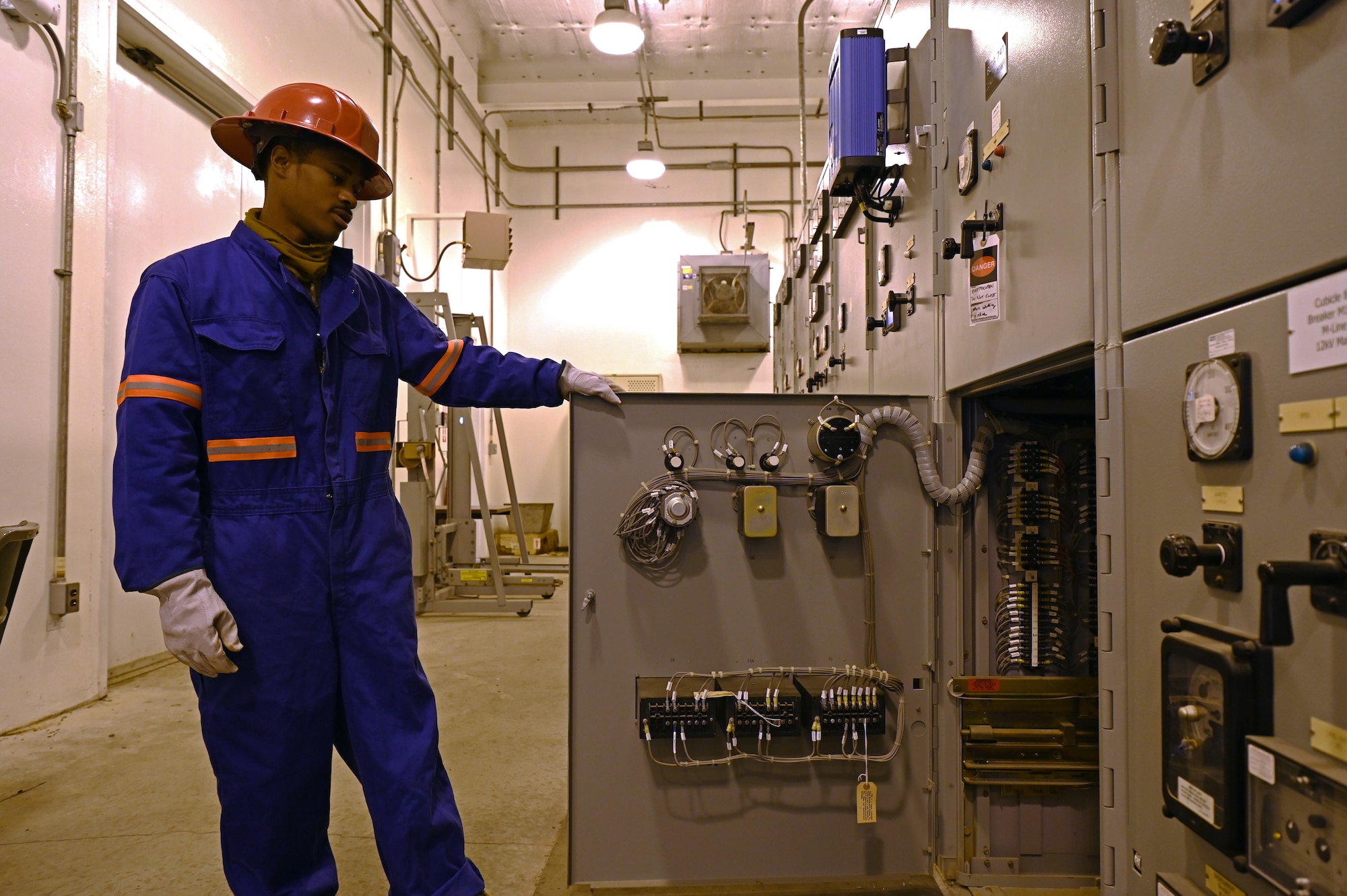 Senior Airman Kenneth Kilpatrick, 30th Civil Engineer Squadron electrical systems journeyman, examines the inside of a substation breaker box prior to maintenance efforts on the South Base M-Line circuit on Nov. 9, 2021 at Vandenberg Space Force Base, Calif. Routine maintenance checks and repairs like these are conducted across the base to help ensure future and efficient distribution of power to Vandenberg. (U.S. Space Force photo by Staff Sergeant Draeke Layman)