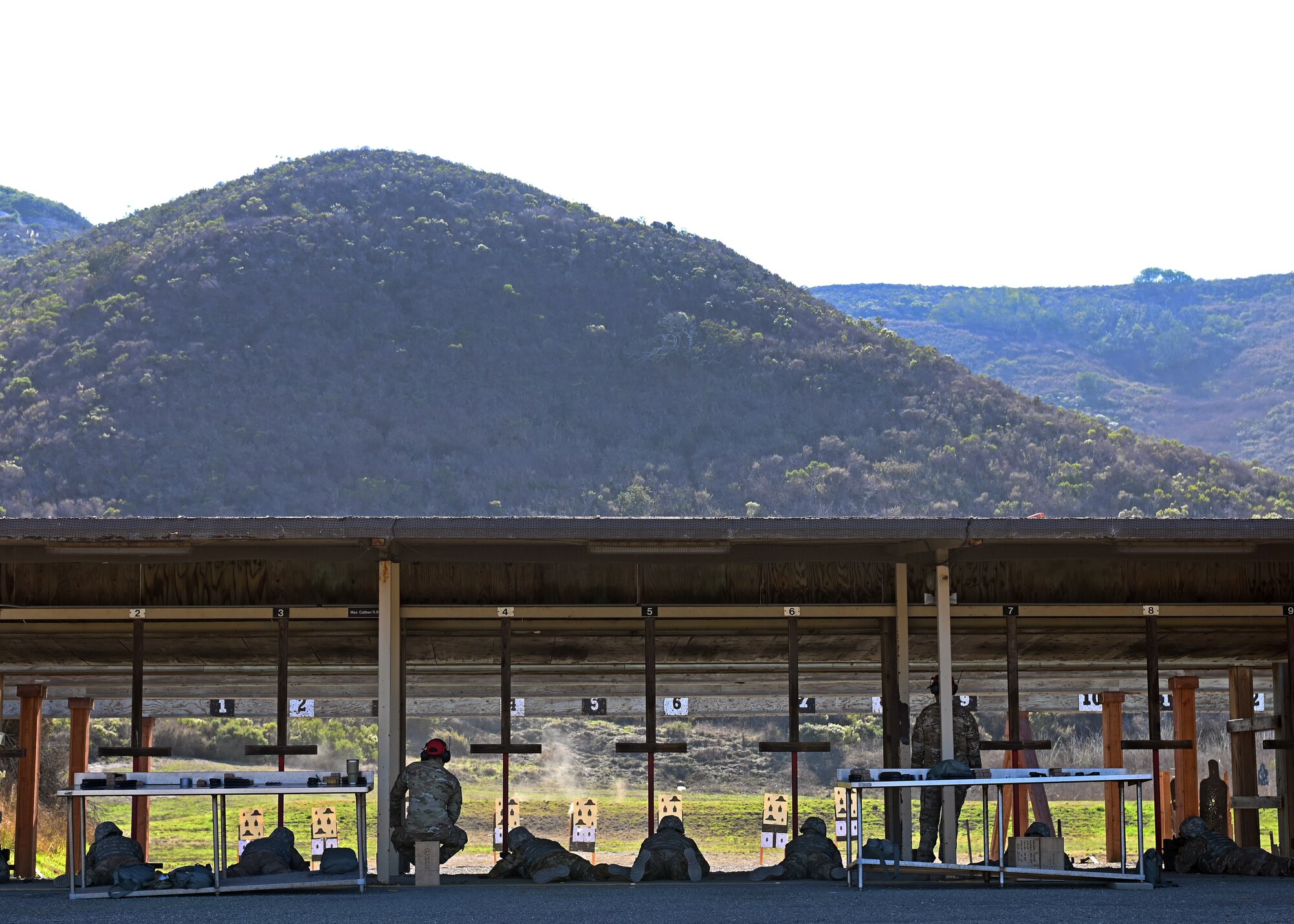 Members of the 30th Civil Engineer Squadron practice shooting for their weapons qualifications training requirements on Nov. 5, 2021 at Vandenberg Space Force Base, California. The 30th SFS provides reoccurring and deployment-ready weapons training to hundreds of Vandenberg personnel each year. (U.S. Space Force photo by Staff Sergeant Draeke Layman)