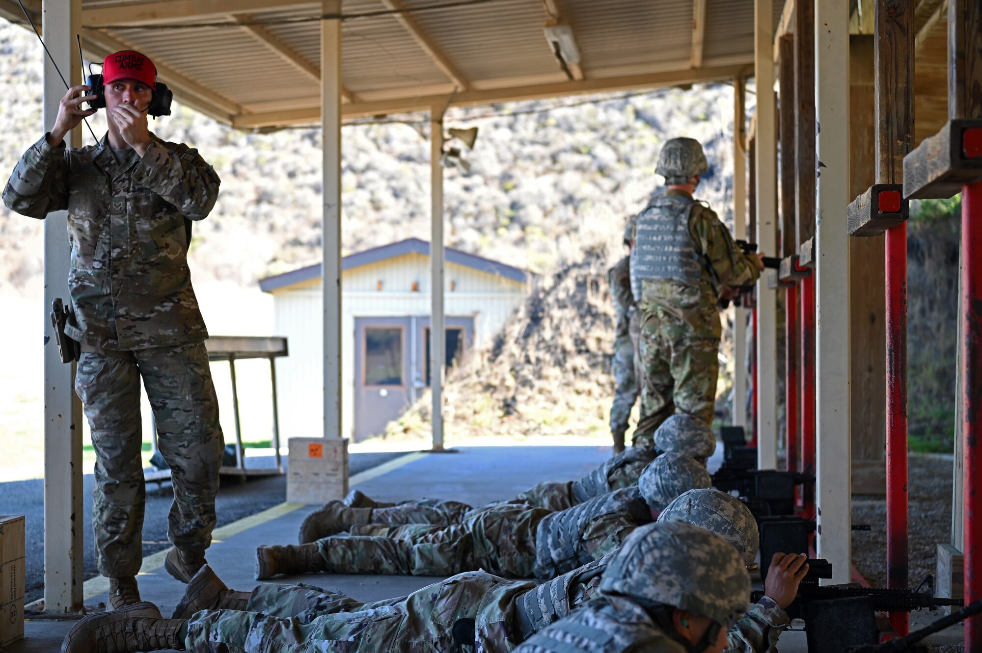 Senior Airman William Boyce, 30th Security Forces squadron combat arms instructor, makes a safety call during live-fire Combat Arms Training and Maintenance qualification training on Nov. 5, 2021 at Vandenberg Space Force Base, Calif. The 30th SFS provides reoccurring and deployment-ready weapons qualification training to hundreds of Vandenberg personnel each year. (U.S. Space Force photo by Staff Sergeant Draeke Layman)
