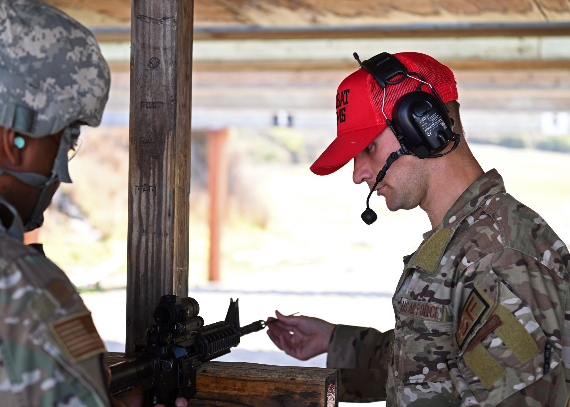 Senior Airman William Boyce, 30th Security Forces Squadron combat arms instructor, inspects a M4 Carbine rifle during a live-fire training at the Combat Arms Training and Maintenance section range on Nov. 5, 2021 at Vandenberg Space Force Base, Calif. The 30th SFS provides reoccurring and deployment-ready weapons qualification training to hundreds of Vandenberg personnel each year. (U.S. Space Force photo by Staff Sergeant Draeke Layman)
