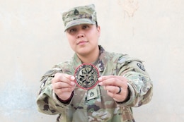 Staff Sgt. Thornton shows tatoos