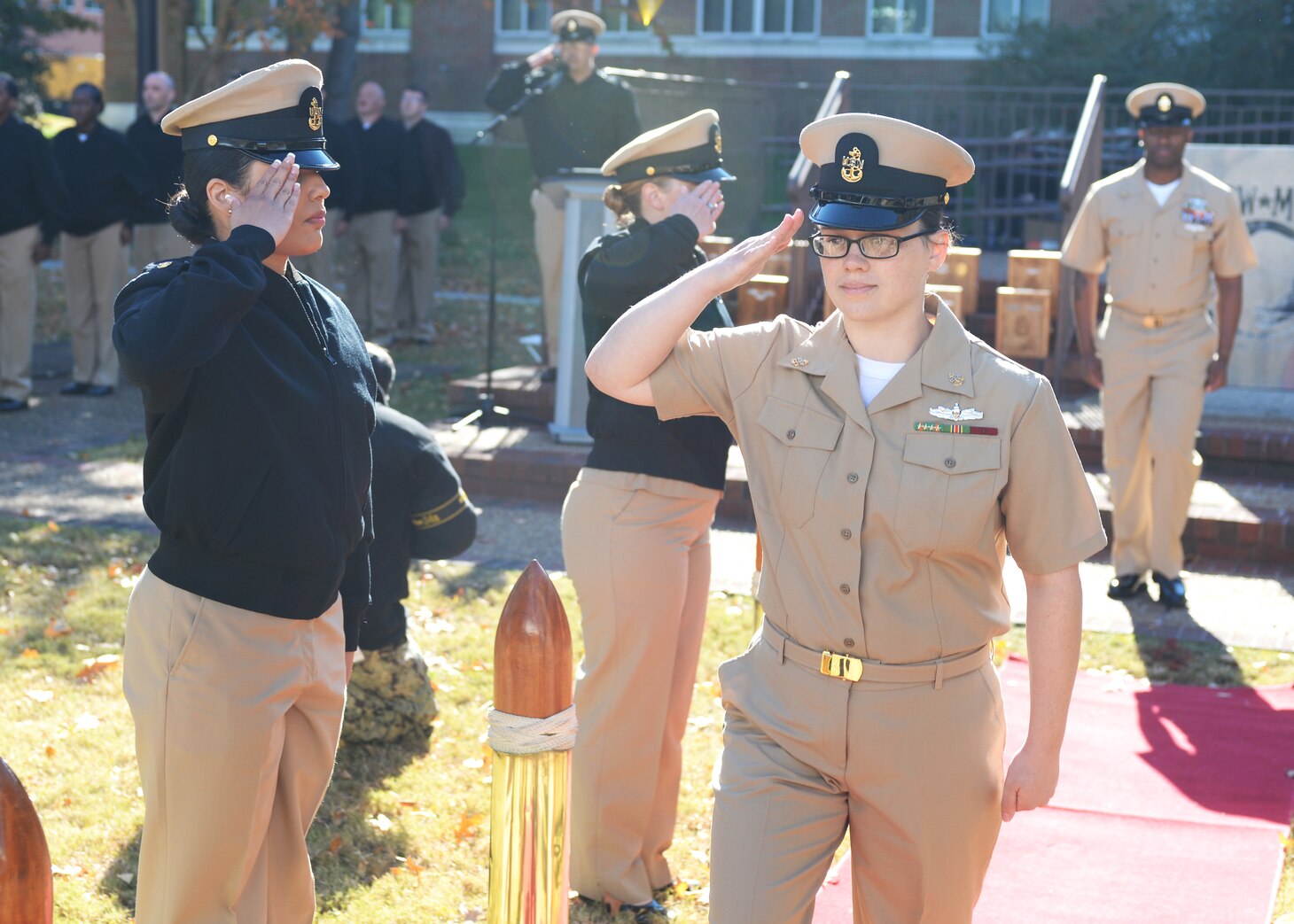 Chief Yeoman Brittney Devera, assigned to Commander, Submarine Force Atlantic, renders a salute after earning her chief anchors during a chief pinning ceremony aboard Naval Support Activity Hampton Roads, Nov. 19, 2021.