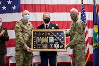 U.S. Army Soldiers assigned to the Vermont National Guard  gathered to witness the Change of Command ceremony for the Command Chief Warrant Officer of The Vermont National Guard, in Colchester, Vermont, Nov 7, 2021. Outgoing Chief Warrant Officer 5 James Woodworth says farewell as he hands the reigns to incoming Chief Warrant Officer 5 Scott Beaulieu. (U.S. Army National Guard photo by Sgt. Denis Nuñez)