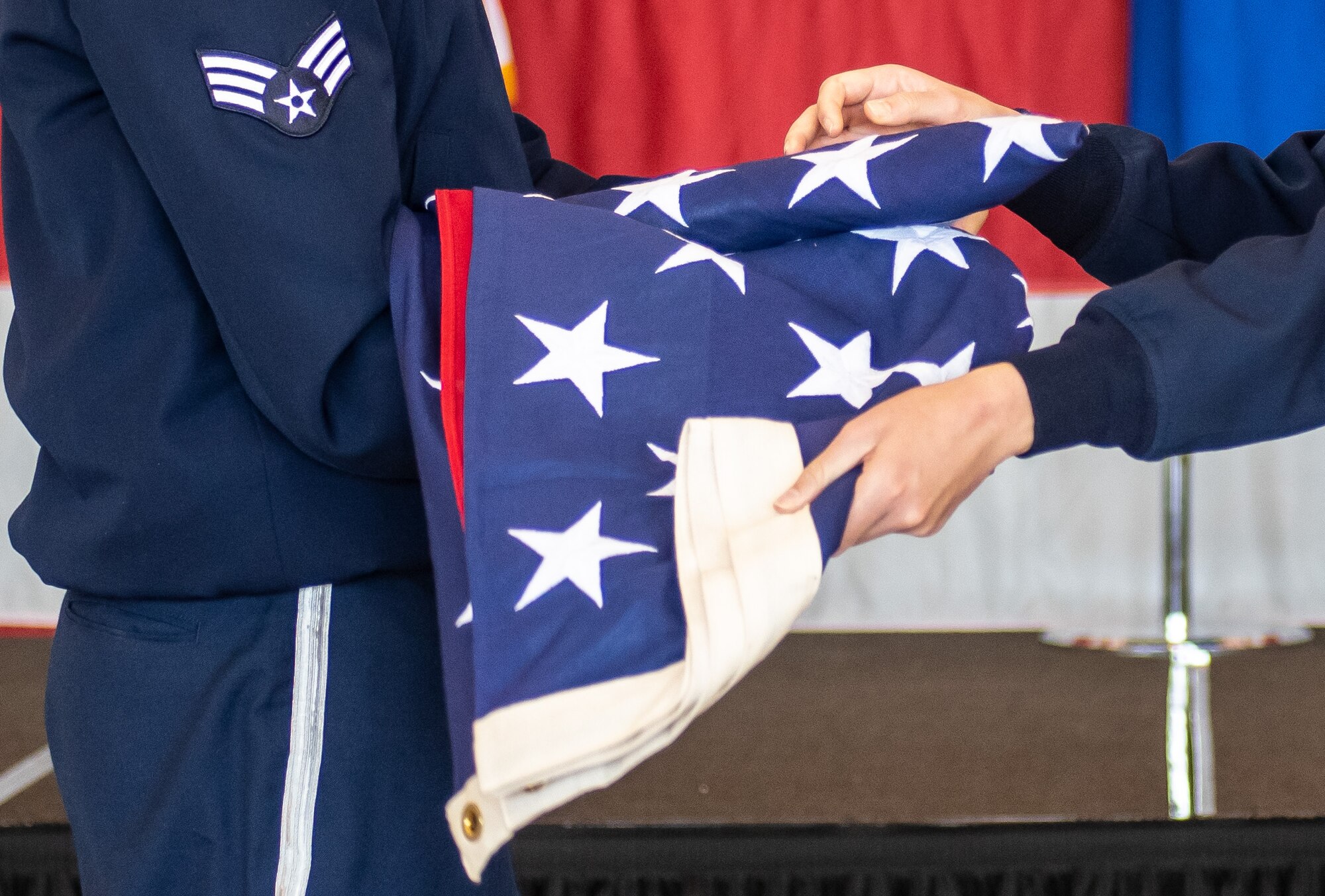 Close up of Reserve Honor Guard members from the 419th Fighter Wing folding the American flag during a retirement ceremony at Hill Air Force Base, Utah on June 6, 2021.