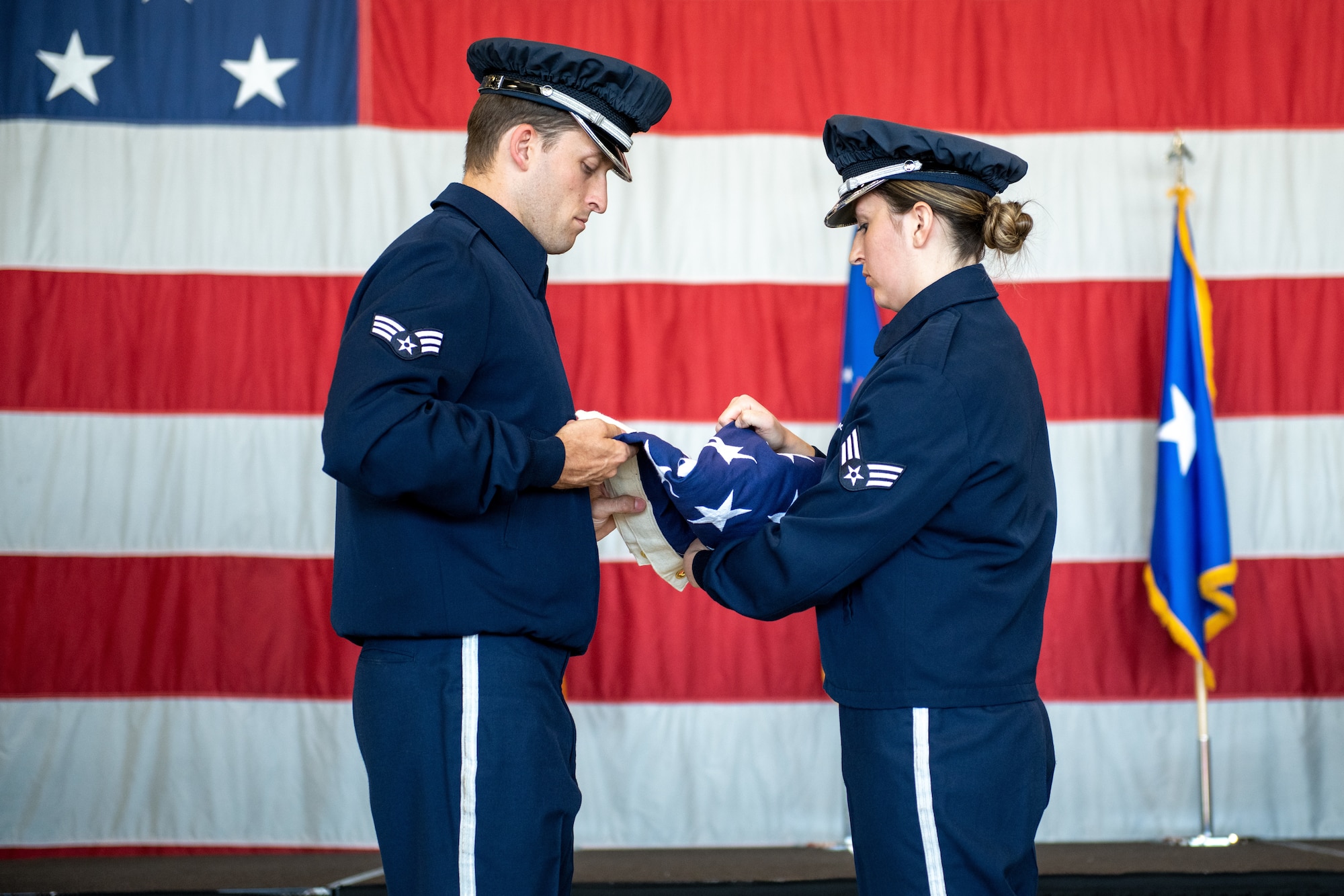 Reserve Honor Guard members from the 419th Fighter Wing fold the American flag during a retirement ceremony at Hill Air Force Base, Utah on June 6, 2021.