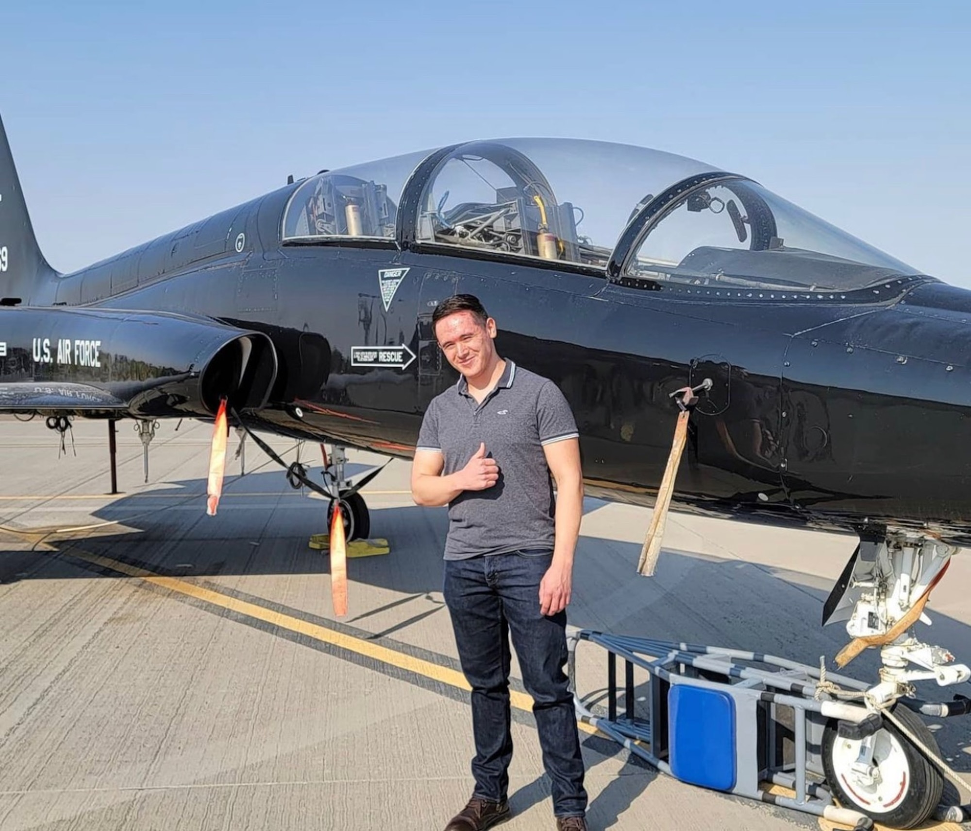 Jacob Moreno, a senior at the University of Texas at El Paso, stands in front of a T-38A Talon at Holloman Air Force Base, N.M., Aug. 20, 2021. Moreno interned with the 586th Flight Test Squadron over the summer, and during his internship coded a program that automatically deciphers airspace data for White Sands Missile Range into a format that aircrews can view while in flight. (U.S. Air Force Photo)