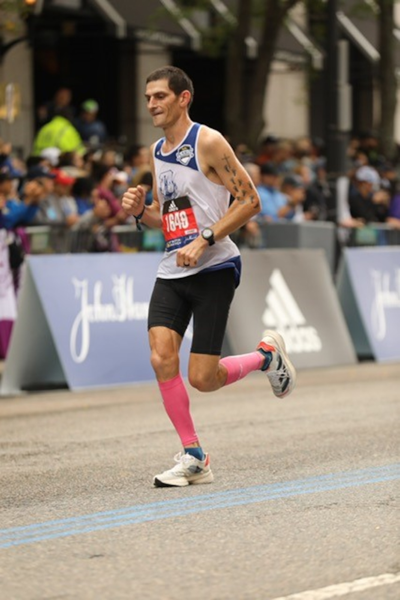 U.S. Air Force Technical Sgt. Matthew Klundt, 144th Fighter Wing Security Forces, participates in the 125th Boston Marathon October 11, 2021.