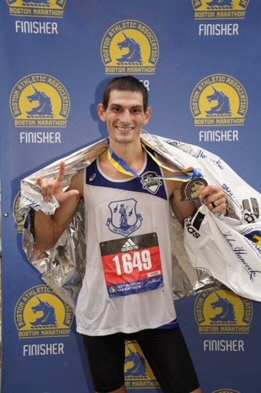 U.S. Air Force Technical Sgt. Matthew Klundt, 144th Fighter Wing Security Forces, participates in the 125th Boston Marathon October 11, 2021.
